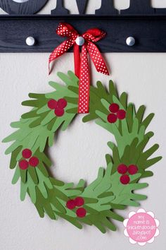 a paper wreath hanging on the wall