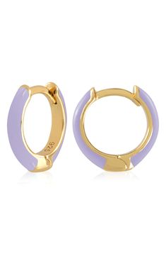 Easy-to-wear hoop earrings will add significant polish to even your most casual ensembles. 1/2" drop; 1/8" width Hinge with snap-post closure Sterling silver with goldtone plate/enamel Imported Trendy Enamel Earrings For Everyday, Nickel Free Enamel Hoop Jewelry, Nickel-free Enamel Hoop Jewelry, Gold Enamel Hoop Huggie Earrings, Gold Enamel Huggie Earrings, Trendy Small Hoop Purple Jewelry, Trendy Gold Enamel Hoop Earrings, Trendy Enamel Huggie Earrings, Trendy Purple Small Hoop Jewelry