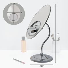 an image of a desk lamp that is on top of a white table with pencils