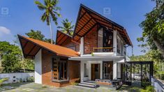 the house is made out of wood and has an orange roof