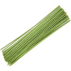 green incense sticks on a white background