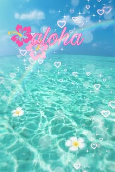 the words aloha are floating in the water with hearts and flowers on it