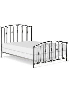 a metal bed frame with white sheets and black iron headboard, against a white background