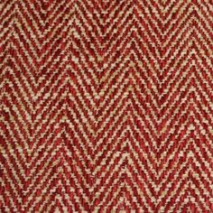 a red and white chevroned pattern on fabric