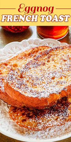 an eggnog french toast on a plate with powdered sugar