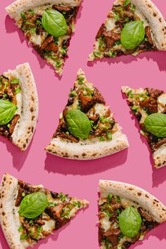 six slices of pizza with various toppings on pink background