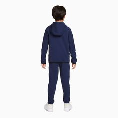 The Nike Sportswear Tech Fleece Set includes a cozy jacket and soft, matching pants for an easy everyday outfit. Benefits Nike Tech Fleece fabric offers the ultimate in lightweight warmth. The design is longer in the back for extra coverage. Cuffs stretch to help keep the fit in place. An elastic waistband stretches to give little ones a snug fit. Product Details Standard fit for a relaxed, easy feel 67% cotton/33% polyester Machine wash Color: Midnight Navy Style: 86H052-U90 Tech Fleece Outfit, Fleece Outfit, Nike Sportswear Tech Fleece, Kids Sportswear, Cozy Jacket, Navy Style, Nike Tech Fleece, Nike Tech, Matching Pants