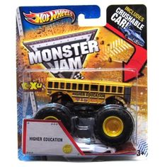 a yellow monster truck with black tires on it's front and back wheels, in the packaging