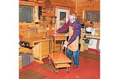 an older man working in a woodworking shop