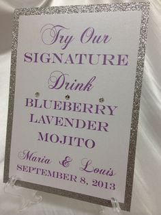 a sign that says, my our signature drink blueberry lavender mojito