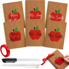 four notebooks with the words miss and mr written on them next to a red ribbon