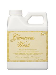 a gallon of glammerous wash with yellow label on the front and bottom