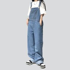 Introducing the 2023 Autumn Collection's street-style staple â€?our Women's Wide-Leg Overalls! Crafted with stretchy material and featuring a medium wash. distinctive buttons & suspenders closure. and an effortlessly cool wide-leg fit. these overalls are the perfect combination of grunge & sophistication.Why They're Your Next Autumn StapleA wardrobe classic. these overalls are the definition of modern fashion. Their unique wide-leg cut provides a bold and stylish look. while their stretchy material ensures comfort without compromising on design. Whether you're headed to a music festival or a day out with friends. you're sure to make a statement with these overalls.Key Highlights: Street Style: A must-have for any fashionista's wardrobe. these overalls are the perfect mix of gritty street s Button Suspenders, Street Style Edgy, Wardrobe Classic, Rugged Look, Grunge Look, Autumn Collection, 2023 Autumn, Medium Wash Jeans, Street Style Chic