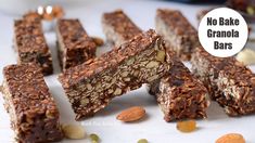 no bake granola bars with nuts and almonds on a white plate next to the words, no bake granola bars