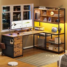 a computer desk sitting in front of a window