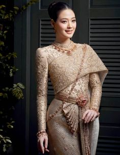 Thai Sivalia costume is seen at events such as royal ceremonies or traditional wedding dress in modern days. Our teams has spent more than 15 years experience doing this craftmanship by ancient handmade embroidery technique following our predecessors. This dress normally takes at least 3-5 months to be finished made by more than 5 embroiderers working together. Package Contents:  1 Dress Materials: Premium Lace, Authentic Brocade Silk, Premium Bead How to body measurement: After Placing order, w Thai Wedding Dress Traditional, Thailand National Costume, Thai Dresses, Thailand Dress, Khmer Dress, Thai Costume, Traditional Wedding Dress, Thai Wedding Dress, Thai Fashion