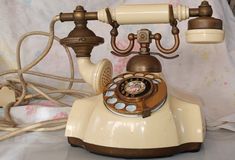 an old fashioned phone is sitting on a table