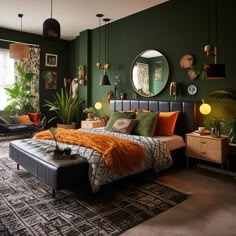 a bedroom with green walls and lots of plants