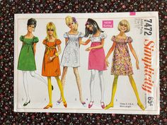 "Simplicity #7472, copyright 1967: sewing pattern for Junior Petites' Dress in Two Lengths.  This pattern is after \"New Sizing,\" for Size 5JP: bust 31\"/waist 22.5\"/hip 32\".  \"The empire dress gathered to lined bodice has low square neckline, back zipper, and short set-in sleeves with elastic casings.  Regular-length V. 1 has optional ribbon tie belt.  V. 2, 3, and 4 are above knee-length.  V. 4 has contrasting skirt.\"   This pattern is uncut and factory folded; the tissue and instructions are like new!  The envelope is in excellent condition with the flap intact and  little wear; some yellowing on the inside.  Stored carefully in a protective plastic sleeve.   Patterns are sold as is and are not returnable.   Order by noon CST Monday through Friday for same day shipping; orders $35 Peasant Dress Sewing Pattern, 1960s Patterns, Mod Mini Dress, Simplicity Dress, Girlie Style, Peasant Style, Empire Waist Dress, Simplicity Sewing, Empire Dress