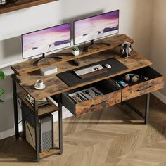 a computer desk with two monitors on top of it next to a plant and bookshelf