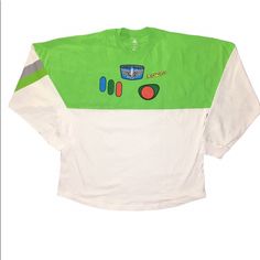 Nwt Buzz Lightyear Toy Story Spirit Jersey Go To Infinity And Beyond And Become A Space Ranger In This White And Green Spirit Jersey! “Space Ranger Action Figure” Text Featured In Puffy Print On The Back With The Action Figure Buttons Featured On The Front. Perfect For Your Next Vacation To Walt Disney World Or Disneyland, To Wear Out Or For Lounging Around The House! Spirit Jerseys Are Super Cozy And Comfortable. As Always, Feel Free To Make An Offer If You Love The Product But Not The Price Cheshire Cat Halloween, Disney Scrub Tops, Disney Spirit Jersey, Tie Dye Disney, Embroidered Tee Shirt, Mickey Sweatshirt, Space Ranger, Minnie Mouse Shirts, Disney Artists