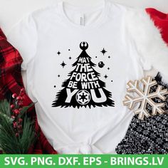 a t - shirt with the phrase may the force be with you on it and a christmas tree