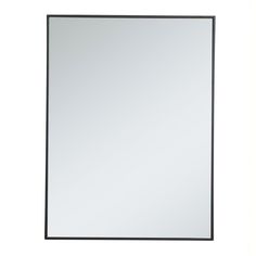 a mirror that is sitting on top of a white surface with black trimmings