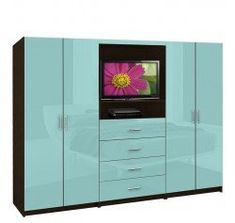 a blue cabinet with a pink flower on the tv in it's center is shown