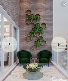 a living room with two green chairs and a coffee table