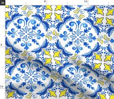 a blue and yellow pattern with stars on the bottom, is shown in full color