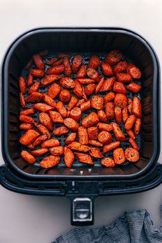 carrots are being cooked in an air fryer