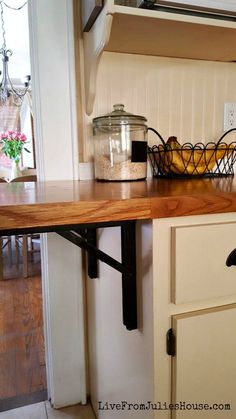 the kitchen counter is clean and ready to be used as a shelf for food items