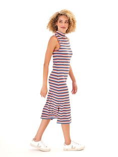 Feel confident and elegant in our Umi Feather Rib Midi Dress. This stretchy, soft ribbed dress features a high neck and flattering fit for a classy and comfortable look. Perfect for any occasion, it will make you feel confident and beautiful all day long! Spring Ribbed Turtleneck Dress, Ribbed Stretch High Neck Midi Dress, Casual High Neck Ribbed Midi Dress, Casual High-neck Ribbed Midi Dress, Stretch Ribbed High Neck Midi Dress, Casual Ribbed High Neck Midi Dress, Casual Ribbed High-neck Midi Dress, Casual Turtleneck Midi Dress, Casual Ribbed Turtleneck Dress