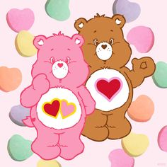 two teddy bears standing next to each other with hearts on their chest and one holding a heart