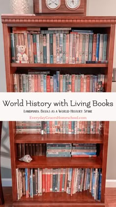 a book shelf filled with lots of books next to a clock on top of it