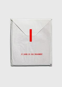 an envelope with the letter i in red on it, sitting against a white background