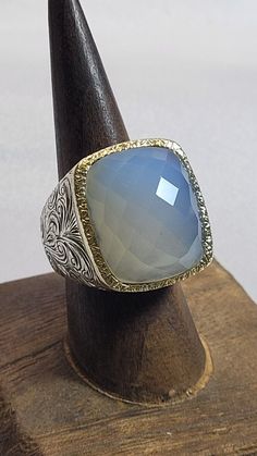 Italy 750 18K Yellow & White Gold Chalcedony Ring Size 8.  This ring weighs 25.9 grams.  The top of the ring measures 24.6mm wide from north to south.  The shank measures 4.8mm wide at its narrowest point.  I cannot make out the maker's mark.  I have researched and have had a very hard time finding anything.   Location - 2A2 Chalcedony Ring, Ring Pictures, Maker's Mark, Hard Time, Makers Mark, Yellow White, Jewelry Watches, Jewelry Rings, Ring Size