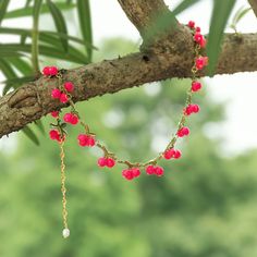 Adorn yourself with the perfect combination of color and elegance with the Pink Berry Necklace. Crafted from exquisite brass, the necklace will sparkle on your neck as the beautiful pink berries shimmer in the light. Perfect for a special occasion or a romantic date night, make sure you're the envy of the town when you accessorize with this luxurious piece. DETAILS Plating: 18K Gold Materials: 18K Gold on brass, Volcanic Rock Measurements: Length:   13.39"(34cm)  + Extender: 3.54"(9cm) Weight: Pink Beaded Necklace With Adjustable Chain As Gift, Berry Necklace, Pink Berries, Diamond Star Necklace, Star And Moon Necklace, Pink Berry, Romantic Date Night, Unique Gift Wrapping, Diamond Evil Eye