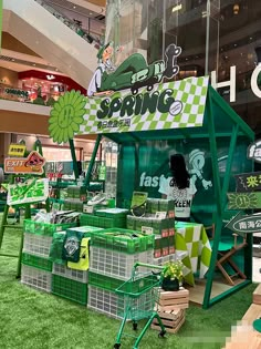 a store with green and white items on display