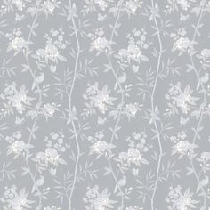 a gray and white floral wallpaper with small flowers on the left side of it