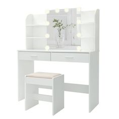 a white dressing table with lights on it and a stool in front of the mirror