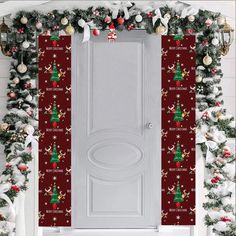 a door decorated with christmas decorations and garlands