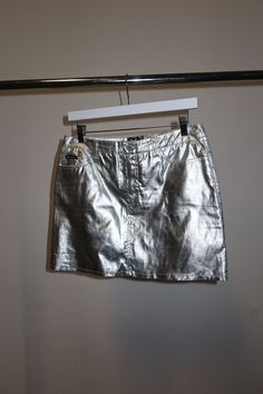 D&G Made in Italy Marked a size 44. Please see measurements below. Waist:  Hips: up to  Length:  Good condition with some general wear. Silver Mini Skirt, Be Grateful, Womens Skirts, Dolce & Gabbana, Metallic Silver, Favorite Outfit, Mini Skirt, Dolce And Gabbana, Art Collection