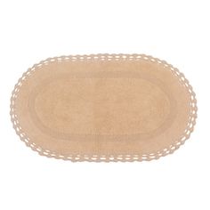 the oval rug is beige with white trim