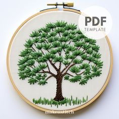 an embroidered tree with green leaves is shown on a white background and has the words, free