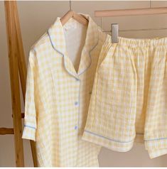 Elevate your sleepwear with our Vintage Gingham Shorts Pajama Set, crafted from 100% cotton for ultimate comfort. Embrace the soft and breathable fabric that gently drapes your body, providing a cozy night's sleep or lounging experience.The set includes a lightweight tank top and matching shorts with a delightful gingham pattern, evoking a sense of timeless charm. The shorts feature a stretchy waistband, ensuring a comfortable and secure fit, allowing you to move freely with ease. Indulge in the Short Pajama Set Plaid, Pajama Plaid Set, Vintage Gingham, Plaid Set, Shorts Pajama Set, Gingham Pants, Cute Pjs, Gingham Shorts, Silk Sleepwear