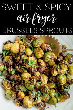 brussel sprouts on a white plate with the words sweet and spicy air fry