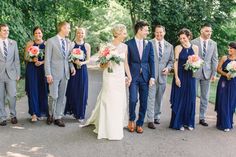 a bride and groom with their bridal party