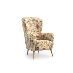 an upholstered chair with floral fabric and wooden legs, on a white background