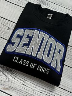 This sweatshirt will be the ULTIMATE staple for your senior year wardrobe this year and a keepsake for years to come! + This crewneck is directly embroidered! The design is stitched directly onto the garment for years of wear! + Please use size chart to determine size. These are unisex sizing. I do not accept returns and/or exchanges so please be sure you pick the correct size! + My turnaround time for adult shirts is typically 10 business days plus shipping time. If you need it sooner or are wo Senior Crewneck Ideas, Seniors Hoodie Design, Senior Year Sweatshirts, High School Senior Hoodie Design, Senior Class Sweatshirts, Senior Sweater, Senior Sweatshirts Ideas, Senior Shirt Ideas, Senior Merch